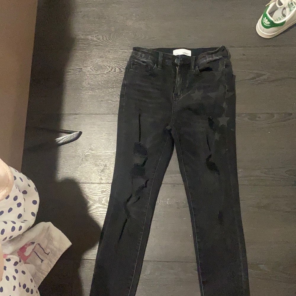 Black ripped star jeans